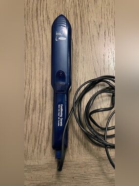 Ion Conditioning Ceramic with tourmaline hair straightener. Works perfectly!